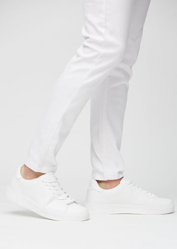 Anklerne på en model, så man kan se, hvor tæt jeansene sidder.