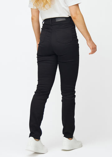 Schwarze hochtaillierte slim jeans von hinten gesehen, damit man das gesamte Produkt sehen kann.
