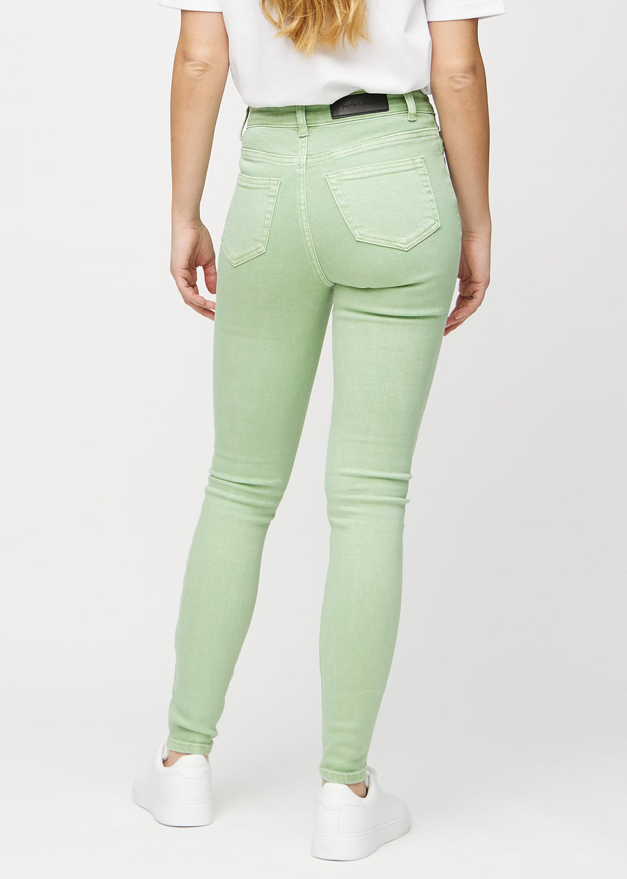 Hellgrüne skinny jeans von hinten gesehen, damit man das gesamte Produkt sehen kann.